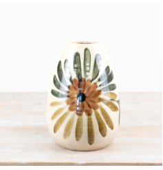 Add charm and light to your space with this elegant ceramic vase.