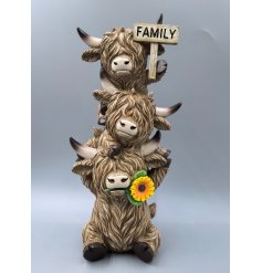 Bring cozy rustic charm to your home with this Trio of Cows Family Plaque Ornament.