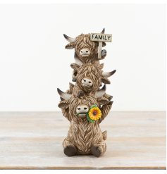 Bring cozy rustic charm to your home with this Trio of Cows Family Plaque Ornament.