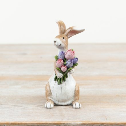 Add a touch of springtime charm to your home with our darling Bunny Decor With Flowers, 