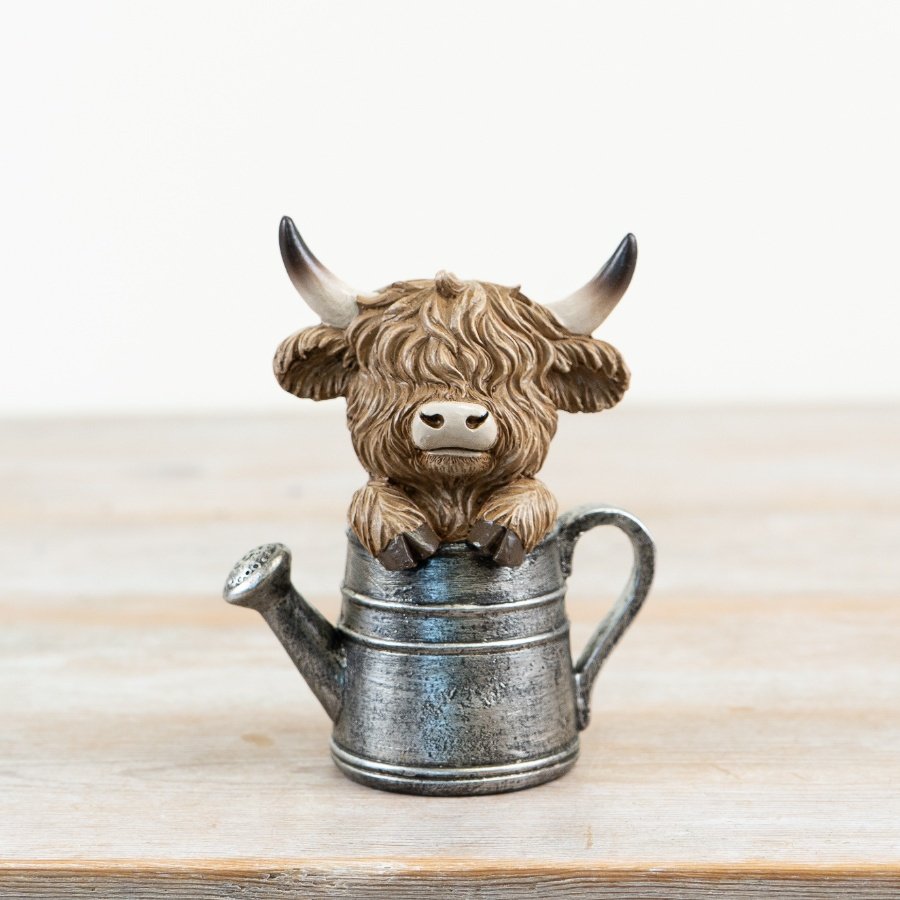 add a touch of charm and whimsy to your home with our cute Highland Cow Decor.