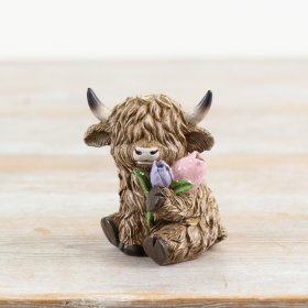Get ready for spring with these charming Easter highland cow decorations! 