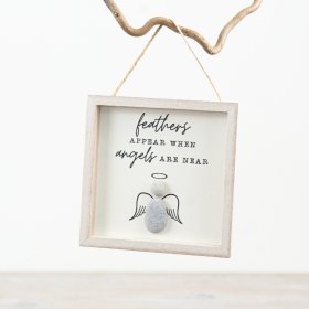 Add charm to your walls with our exquisite wooden feather wall art. 