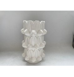 Elegant tall white vase featuring a charming repeated bunny head design.