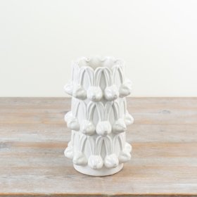 Elegant tall white vase featuring a repeating bunny head design for a charming touch.
