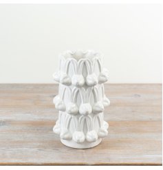 Elegant tall white vase featuring a charming repeated bunny head design.