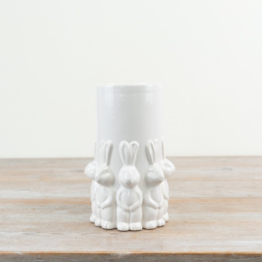 Meet this elegant Easter vase featuring standing rabbits in a smooth white glazed design.