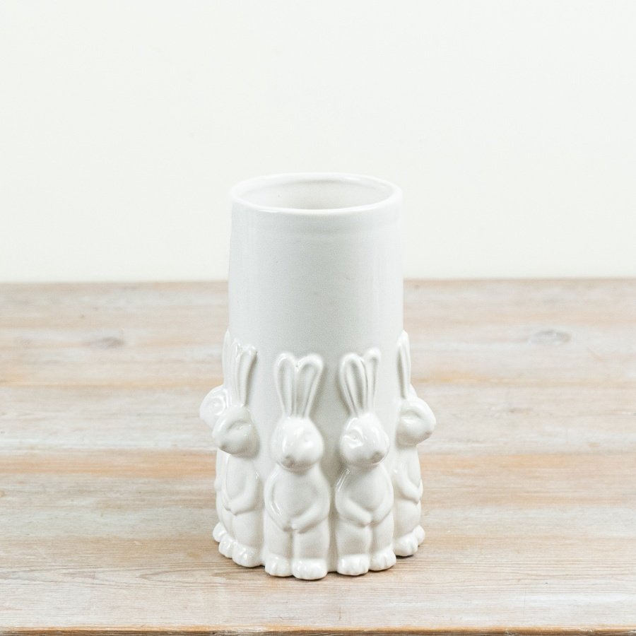Meet this elegant Easter vase featuring standing rabbits in a smooth white glazed design.