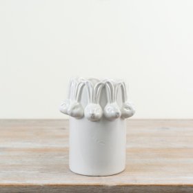 Welcome spring with this stylish white glazed vase, featuring a charming repeating bunny head design.