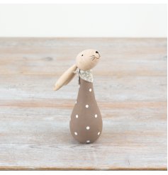 Wooden bunny with brown polkadot pattern, perfect for adding a touch of spring to your display.