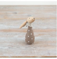 Add a charming touch to your spring decor with our polkadot wooden rabbit, perfect for creating a neutral display.