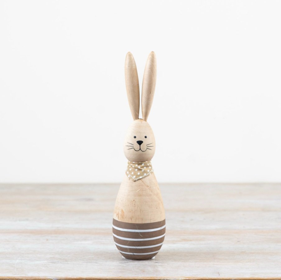Add a delightful touch to your decor with our wooden rabbit donning a playful polkadot scarf!