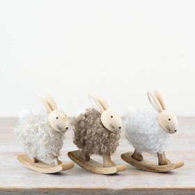 Bring cozy rustic charm to your spring and Easter décor with this charming standing wooden fabric rabbit.