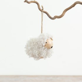 Add a charming Spring touch to your home with this adorable sheep ornament hung on jute twine.