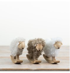 Adorable wooden sheep ornament featuring a cozy fabric body.