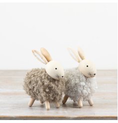 Add a cosy, rustic touch to your spring and Easter décor with this charming Wooden and Fabric Rabbit,