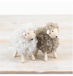 A mix of 2 sheep ornaments in white and natural colour assortments.