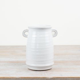 A timeless vase with small eared handles. A hand finished product with a subtle white crackled glaze.