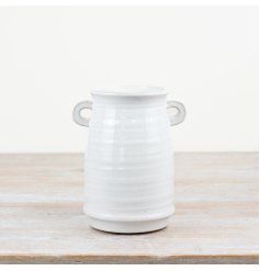 A timeless vase with a white crackled finish and small eared handles. 