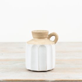 Sleek ceramic pitcher adds elegance to any table setting. 