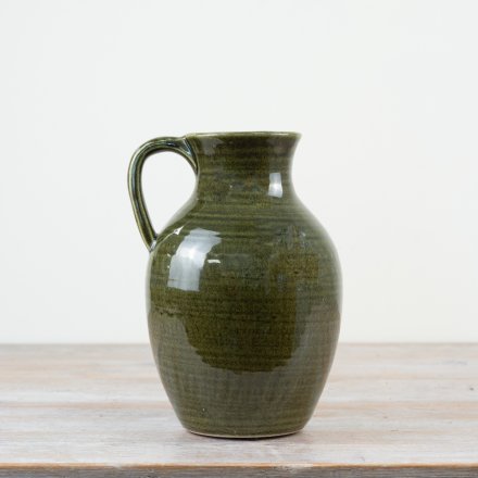 Unique pitcher vase with a brilliant green glaze
