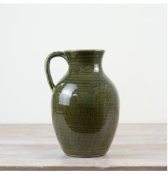 Unique pitcher vase with a brilliant green glaze