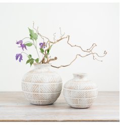 A stylish vase with etched detailing. A chic interior accessory and gift item with 2 sizes available. 