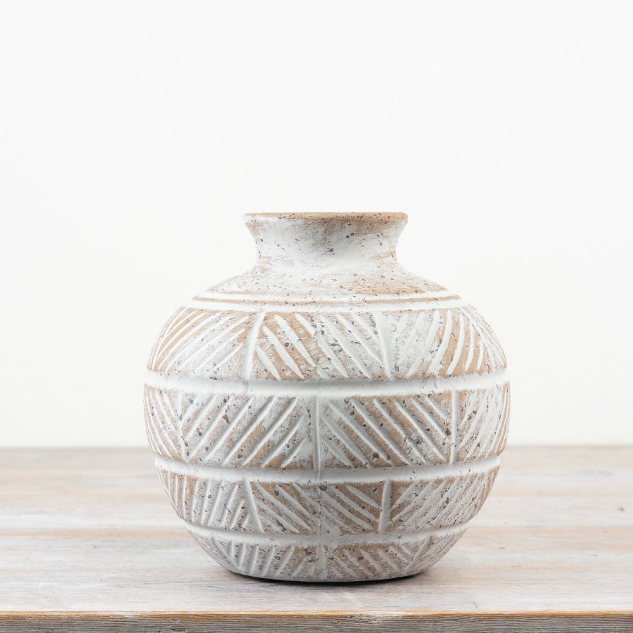 Enhance your space with the Jabari Ceramic Vase 