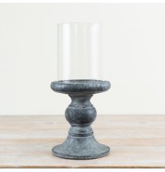 a stunning glass and cement candle holder 