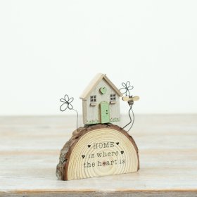 Bring rustic charm home with our Log House Deco made from natural wood for a touch of nature-inspired elegance.