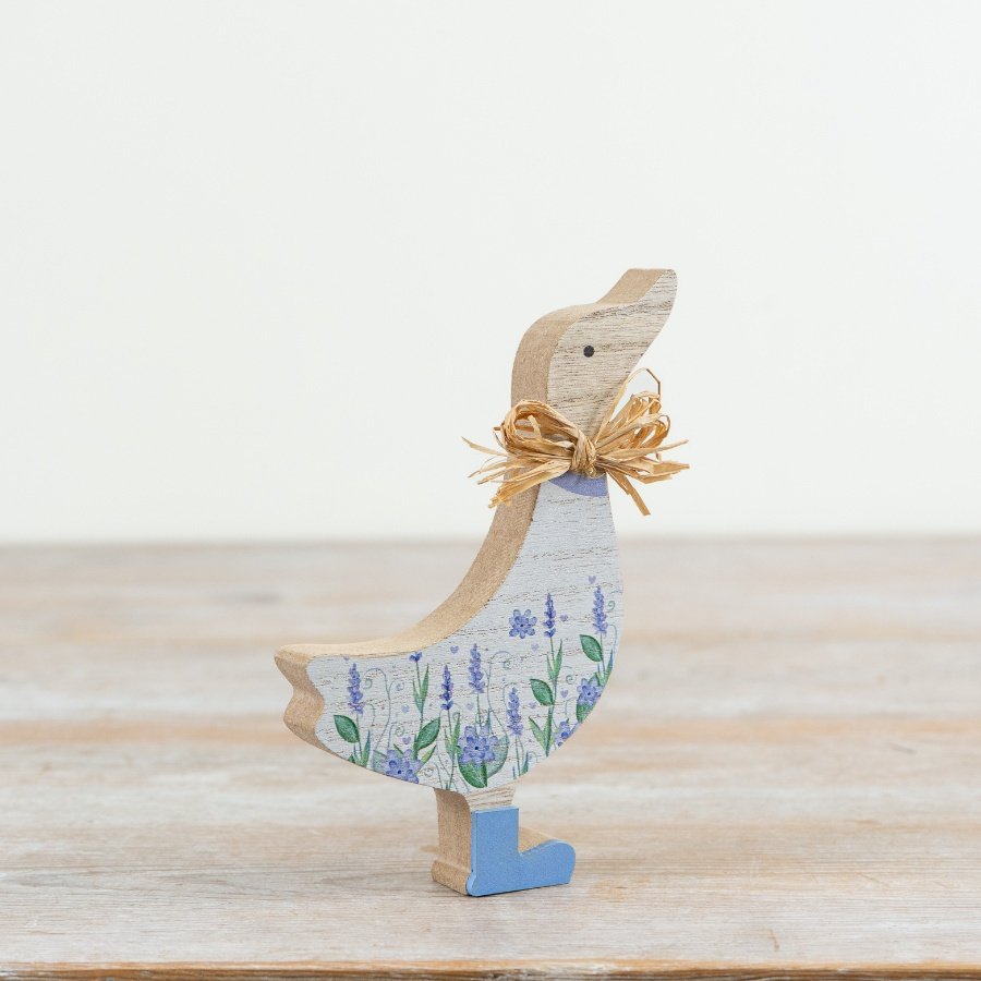 Celebrate Easter with our delightful Wooden Duck adorned with lovely flowers!