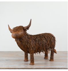 Bring rustic charm to your home or garden with this charming Cattle Ornament.