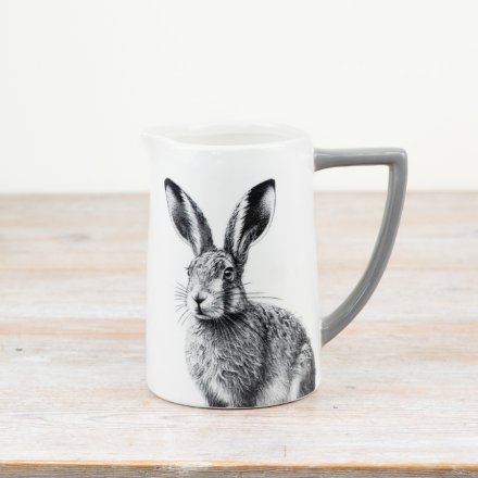 Handsome glazed jug adorned with a whimsical hare design - perfect for any collection!