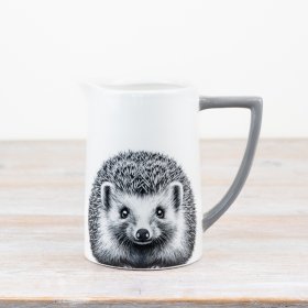 Adorable hedgehog motif vessel can be used as a charming jug or elegant vase. 
