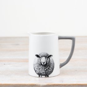 Charming sheep design milk jug perfect for adding style to your table.