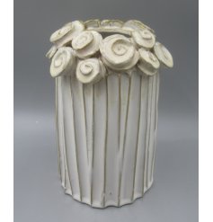 Elegant vase featuring a delightful floral pattern.