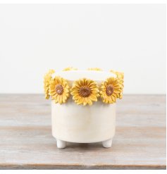 Add warmth and beauty to your living space with our charming sunflower planter.