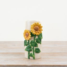 Gorgeous sunflower vase makes a statement that stands out on any shelf.