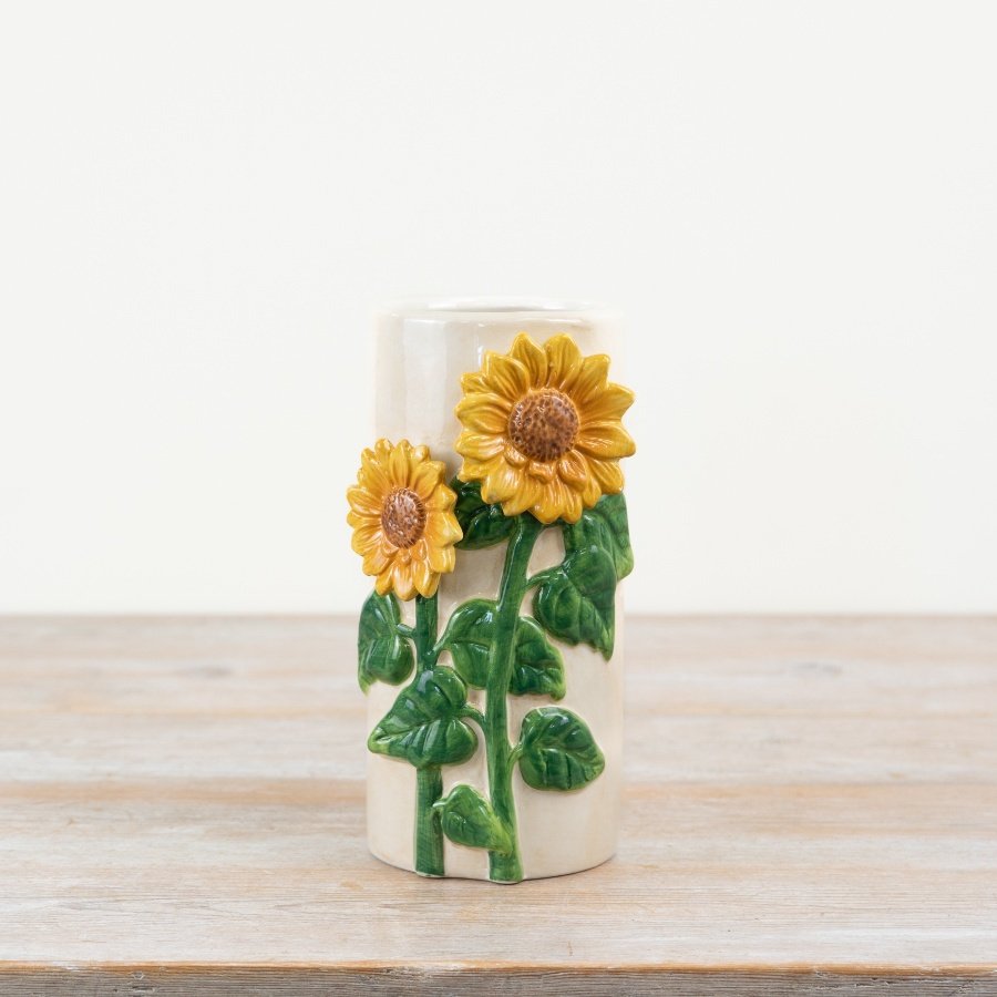 Gorgeous sunflower vase makes a statement that stands out on any shelf.
