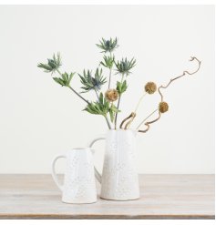 Enhance your home decor with our exquisite Embossed Leaf Design Jug 