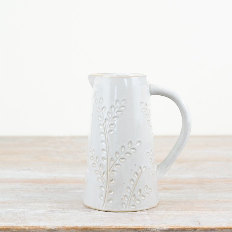 Infuse elegance into your home with our gorgeous Embossed Leaf Design Jug