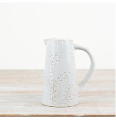 Add a touch of elegance to your home with our stunning Embossed Leaf Design Jug. 