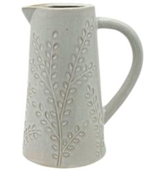 Beautifully crafted jug with elegant embossed design.