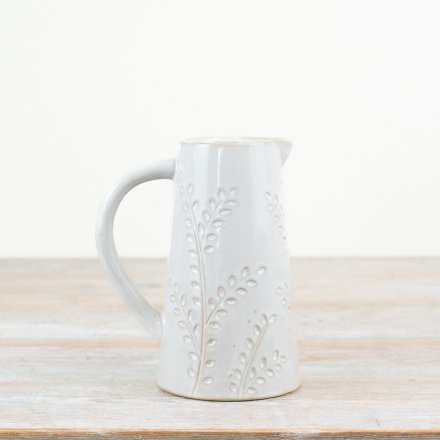 Beautifully crafted jug with elegant embossed design.