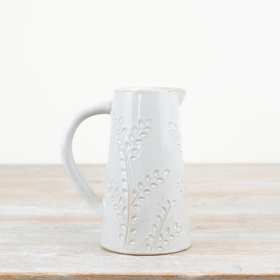Exquisite embossed jug adds an elegant touch to your table setting. 