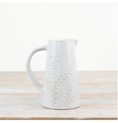Beautifully crafted jug with elegant embossed design.