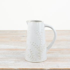 Exquisite embossed jug adds an elegant touch to your table setting. 