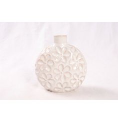 Unique short vase with chic neck, perfect for displaying colorful blooms.