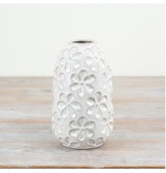 Add charm to your decor with a whimsical porcelain vase featuring a delightful daisy design.