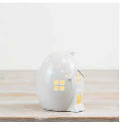 Create a warm glow in the home this season with this unique egg shaped light up house. 